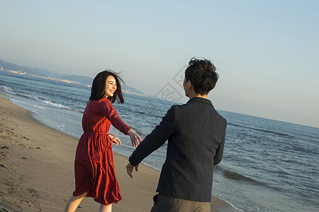 青少年日本人兴致勃勃夫妻海岸图片