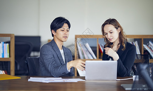 商务办公楼个人电脑职业妇女职业全球商务会议背景