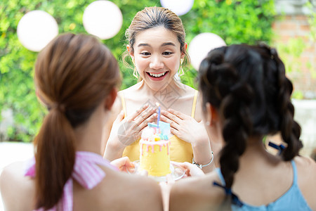 年轻女子生日幸福派对惊喜少女高清图片素材