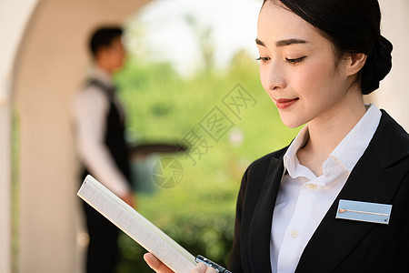  酒店管理商务女性接待形象图片