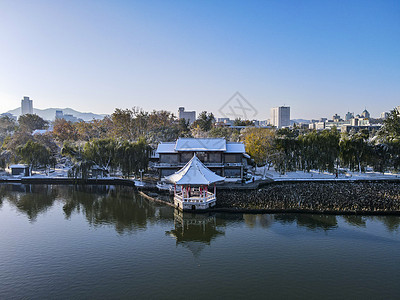 大明湖景区航拍山东济南大明湖5A景区雪景背景