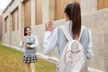 青年学生面对面打招呼图片