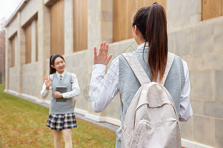 青年学生面对面打招呼图片