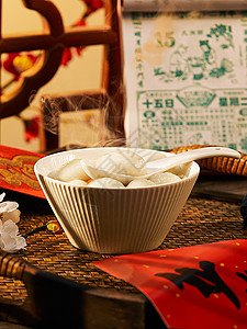 元宵节热气腾腾的中式传统芝麻汤圆背景