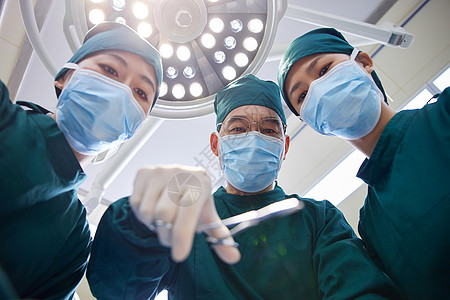 護士節在手术台上工作的医生背景