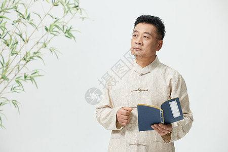 中国传统文化中年男性阅读朗诵中国元素高清图片素材