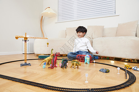 儿童在玩玩具在客厅玩玩具的小男孩形象背景