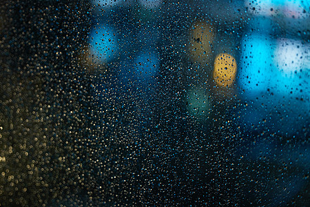 窗户雨滴被雨水打湿的玻璃背景