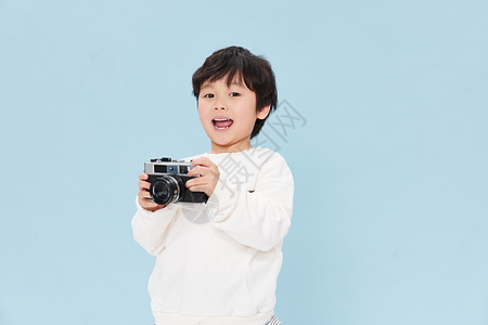 拿相机男孩拿相机的小男孩背景