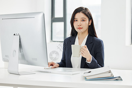 职业商务女性喝茶办公图片
