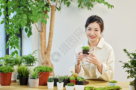 禁毒公益手拿盆栽植物的女性背景