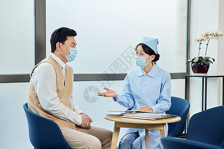 男患者与女护士在医院交谈医学高清图片素材