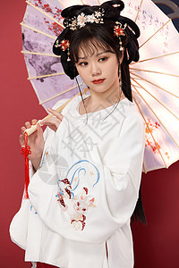 中国风传统梅花汉服美女撑伞图片