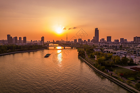 城市运河上的日落高清实拍摄影图图片