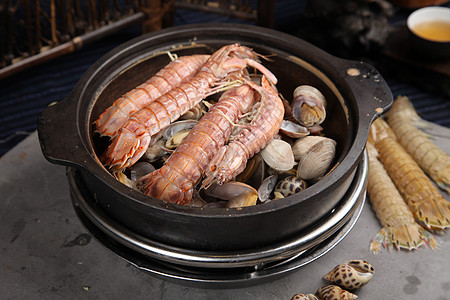 海鲜石锅美食美食石锅海鲜背景