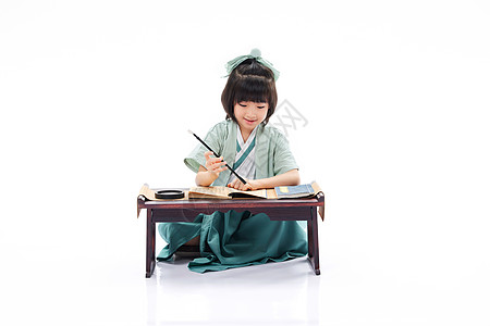 国学小女孩课堂上学习书法毛笔字高清图片