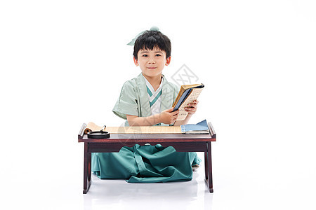阅读国学书籍的小男孩中国风高清图片素材