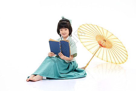 穿汉服的小女孩阅读古书中国风高清图片素材