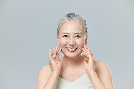 老年生活健康老年女性保养护肤概念背景