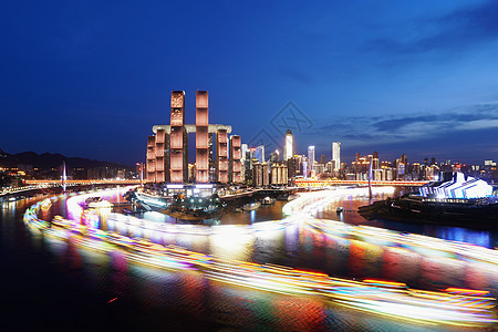 重庆解放碑夜景与长江船轨背景