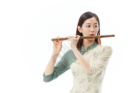 吹笛子的文艺青年女性图片