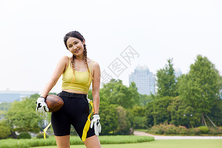 青年运动女性腰旗橄榄球运动背景图片