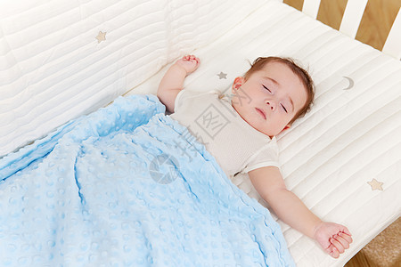 睡着的可爱婴儿微笑高清图片素材