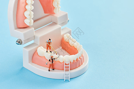 牙齿创意创意小人牙齿口腔修护概念背景