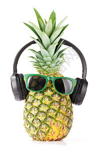 带有太阳眼镜和耳机的柠檬菠萝图片
