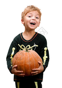 万圣节穿骷髅南瓜的男孩肖像图片