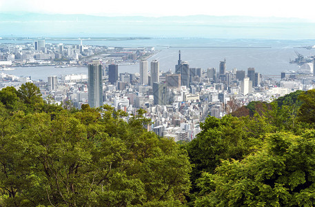 玉龙雪山索道从六甲山鸟瞰神户市和神户港岛日本兵库县神户市的天际背景
