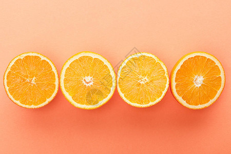 橙色背景的切柑橘图片