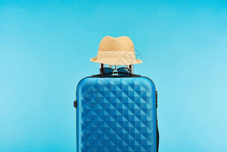 蓝色蓝色和彩色旅行袋上面有太图片