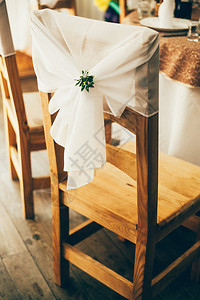 保障服务在活动派对或婚礼上装饰精美的椅子背景