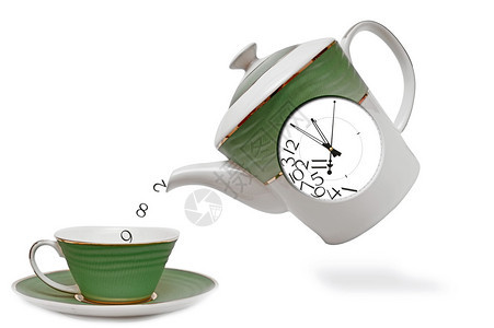 前面有时钟的瓷茶壶下午茶时间图片