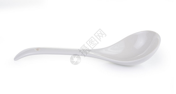 白色背景上的白色空陶瓷勺子图片