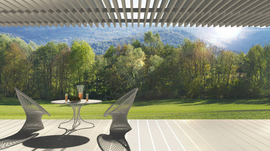 带休息区扶椅和早餐桌全美花园草地的背景图片