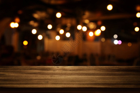 餐厅灯光背景模糊的抽象面目前的图片