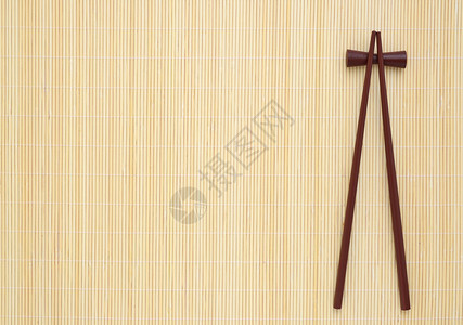 与两根寿司筷子的背景图片