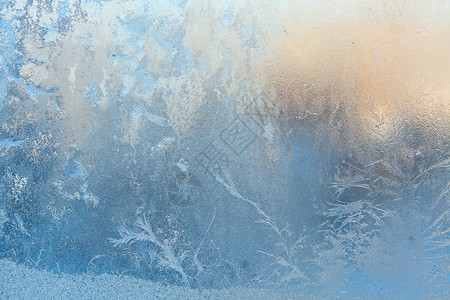 窗上霜冻的美丽冬季纹理图案图片