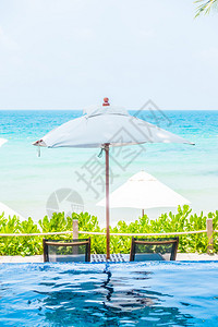 美丽的豪华伞和在旅馆度假村游背景图片