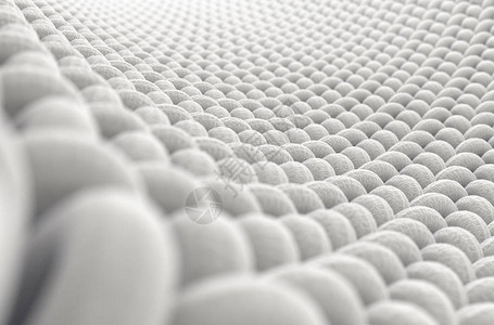 白色背景上简单的织纺品的缩微镜近视图片