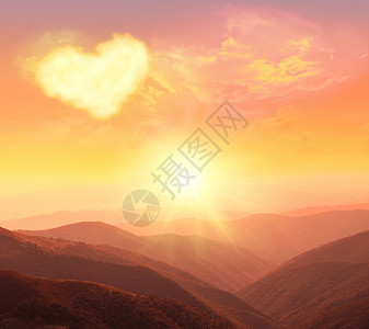 心爱和情人节在山的日落图片