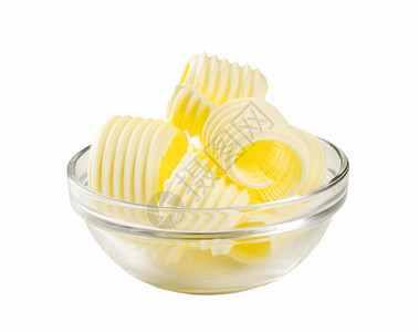 黄油卷子在一个玻璃碗里背景图片