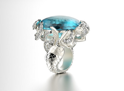 灰色背景中带蓝色宝石的银戒指背景图片