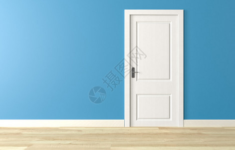 关闭蓝色墙壁上的白色木门背景图片