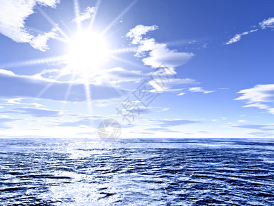 明亮的阳光在海洋上闪耀着镜头耀斑图片