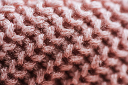粉红色羊毛织物背景的全帧图像图片