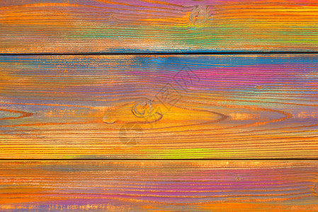 明亮多彩的斑驳背景木制背景涂上颜色木材的质地空白背景可用空图片