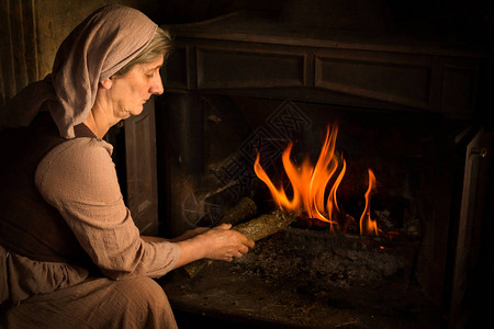 文艺复兴旧主肖像一名农民妇女给燃烧的图片